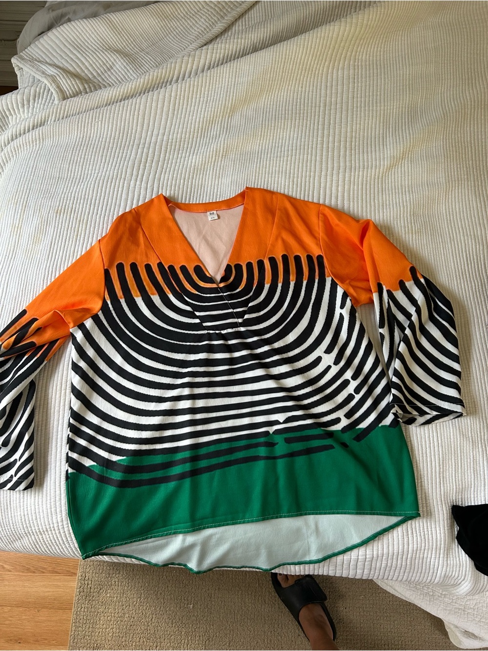 Vibrant Geo-Stripe V-Neck Top in Orange, Black & Green